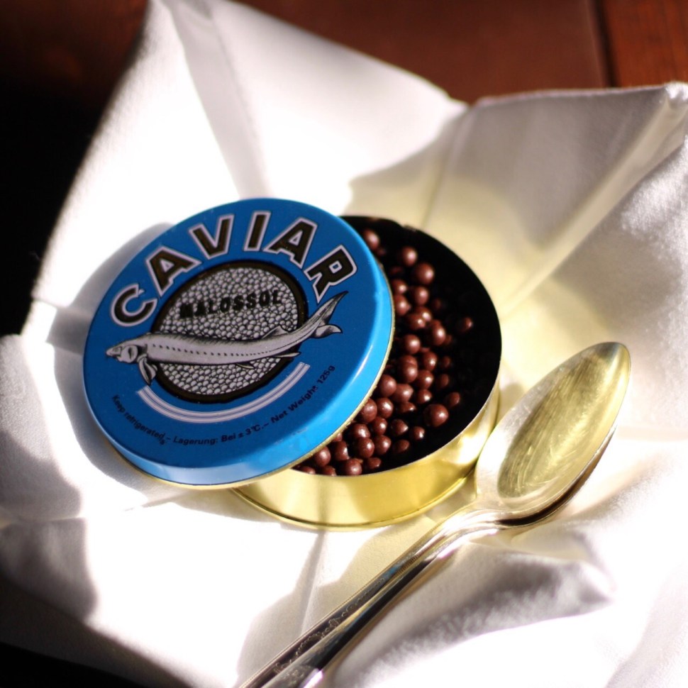 Chocolate balls served in a caviar tin.