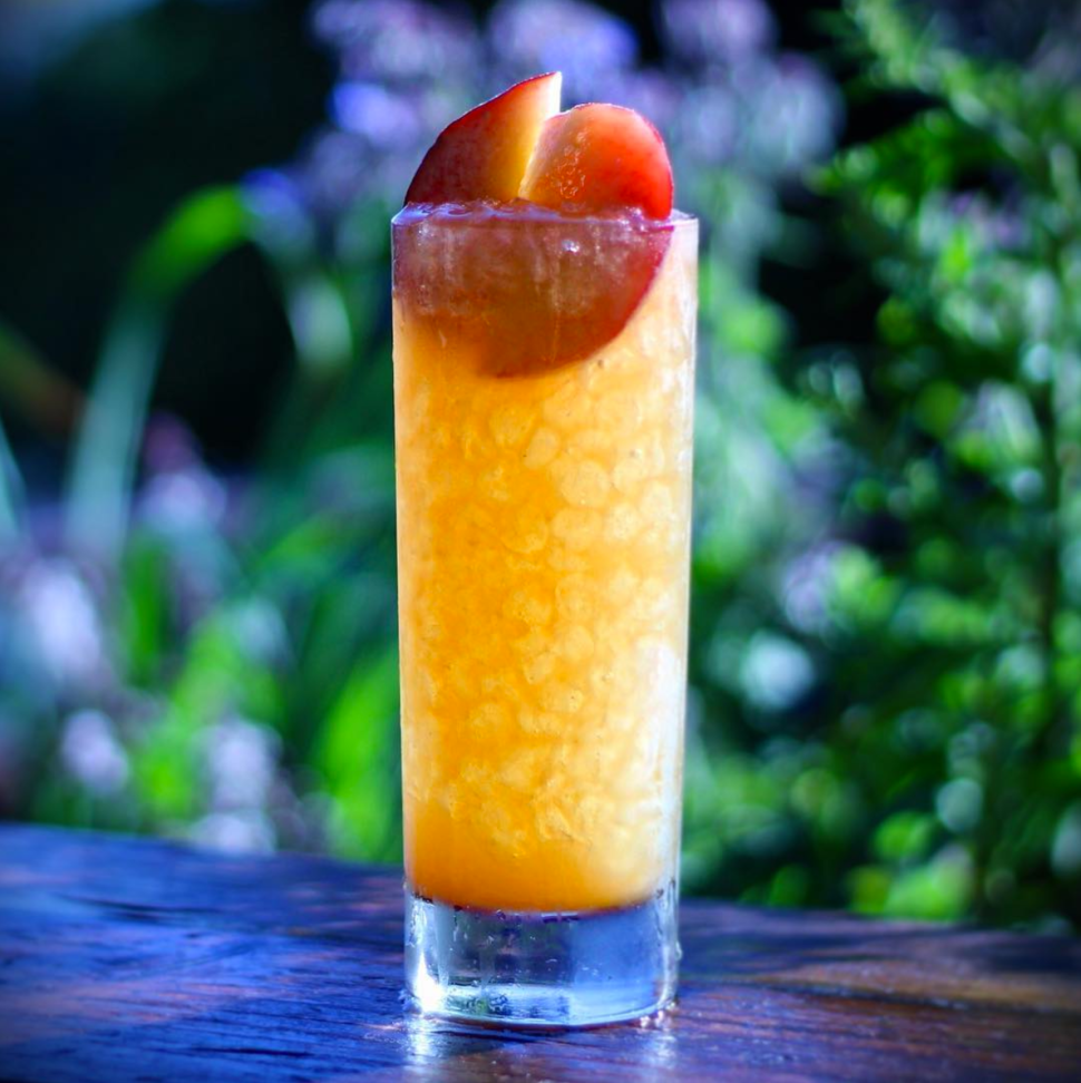 An icy, fruity, refreshing cocktail outdoors at Eveleigh.